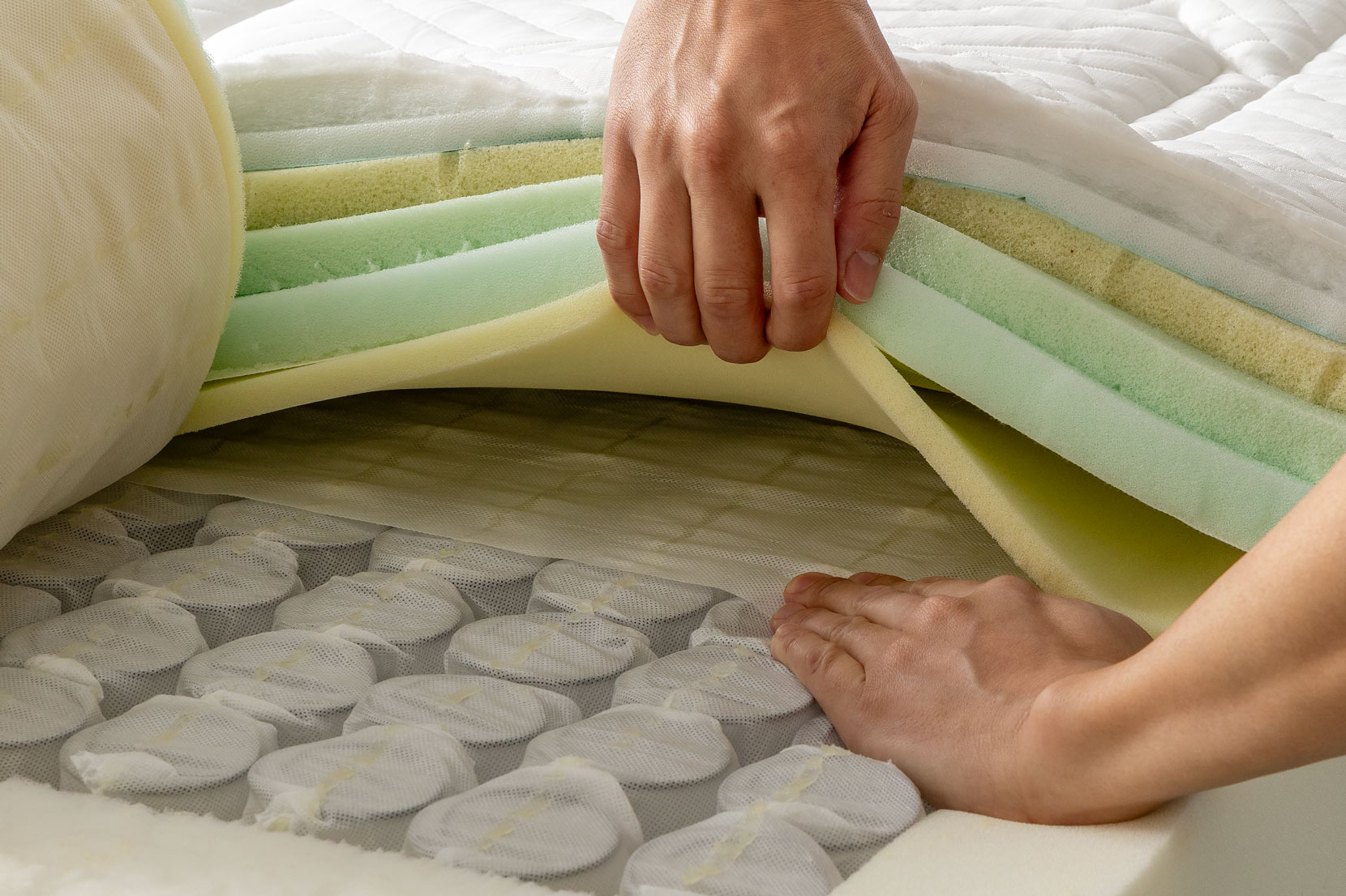 ポケットコイルが接着剤で固定